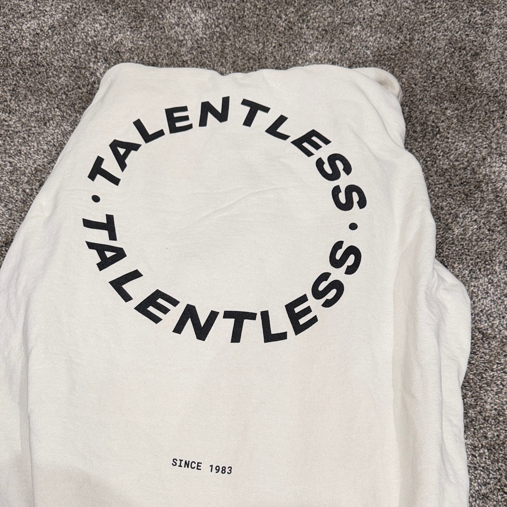 Talentless Cream Hoodie with Black Graphic